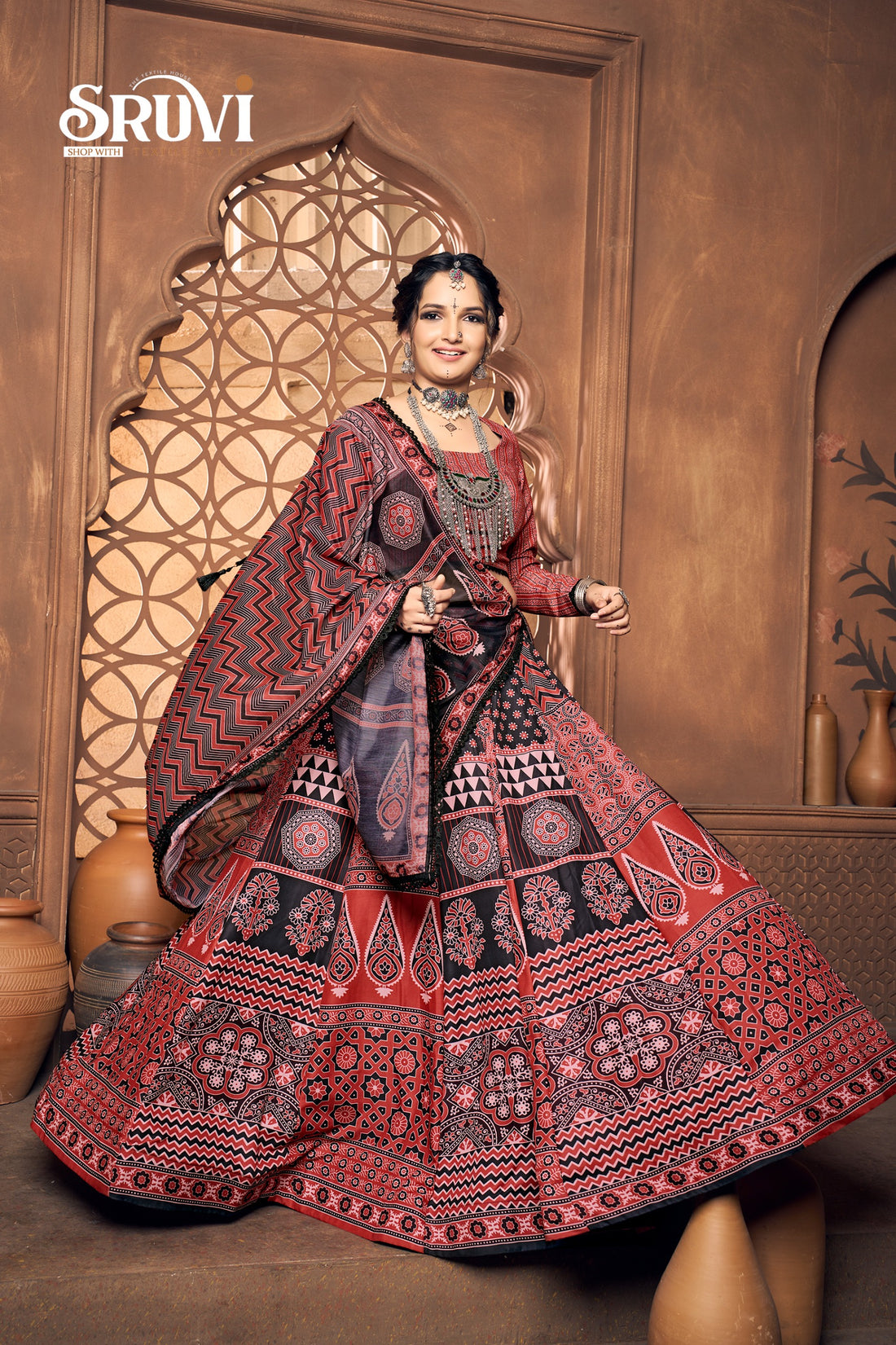 Ikat Batik Lehenga Choli – Timeless Sindhi Craft in Red & Black"